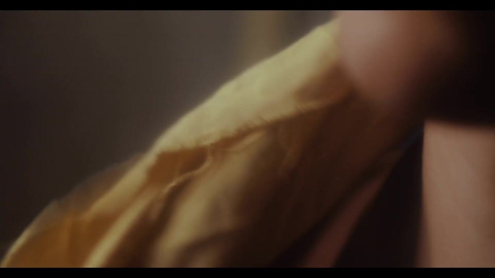 A man and a woman in a dim room, she wears a blue headscarf and a pearl earring (1/8)